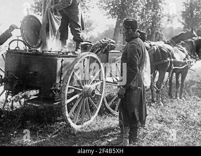 Men cooking on wagons for French soldiers during World War I ca. 1914-1915 Stock Photo