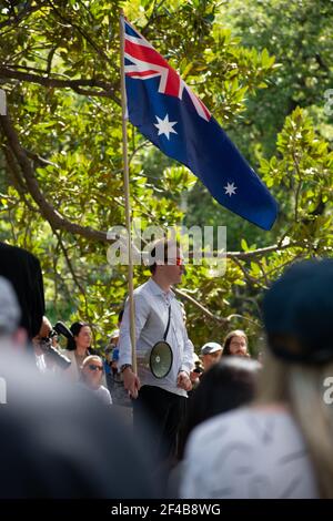 Melbourne, Australia. 20th Mar 2021. Protesters gather in Flagstaff Gardens as part of a worldwide protest for freedom against the COVID-19 vaccination. March 20, Melbourne, Australia. Credit: Jay Kogler/Alamy Live News Stock Photo