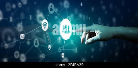 Close up of businessman using finger touch Network Structure on Hologram Screen with World map background. Network Structure Concept. Stock Photo