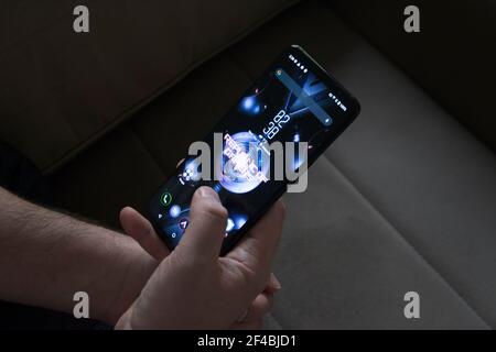 Belgrade, Serbia – March 17th, 2021: A Man Holding Asus ROG Phone 5 Stock Photo
