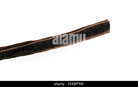 Vanilla pod cut with knife, aromatic seeds visible, closeup detail photo isolated on white background Stock Photo