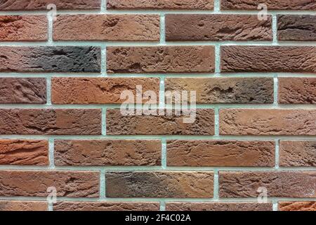 Clinker brick of brown color. Clinker thermal panels for finishing the facade of the house. Tiles for outdoor decoration Stock Photo