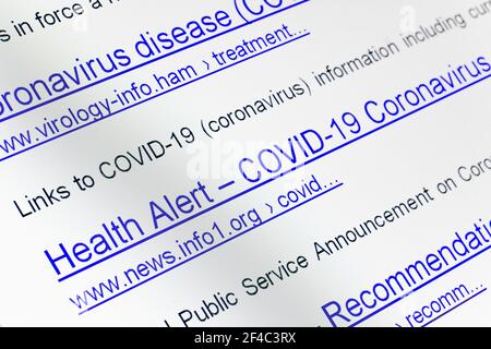 Internet search results for coronavirus with The links of imaginary no-existing websites on display, close up. Stock Photo