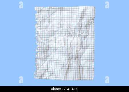 Torn and crumpled sheet of white paper from a student notebook on a blue background Stock Photo