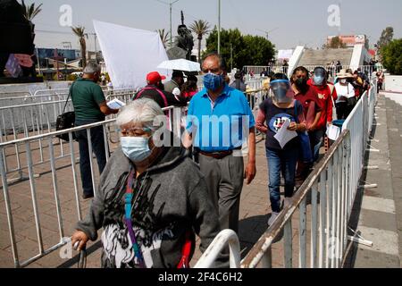 Non Exclusive: NEZAHUALCOYOTL, MEXICO - MARCH 19: Thousands of adults over 60 years of age went to the Nezahualcóyotl City Hall to receive the Covid19 Stock Photo