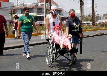 Non Exclusive: NEZAHUALCOYOTL, MEXICO - MARCH 19: A elderly arrives at the Nezahualcóyotl City Hall to receive the Covid19 Sinovac vaccine. Adults ove Stock Photo