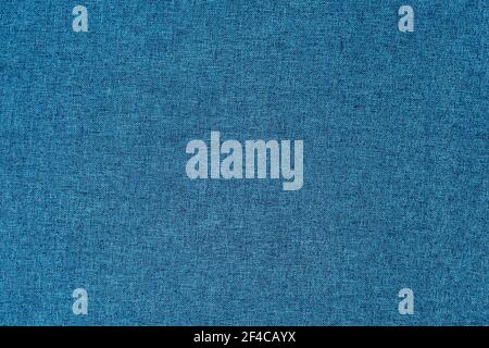 Dark blue, grainy textured surface, top view, banner. Background of blue cloth thread texture. Large seamless fabric texture Stock Photo