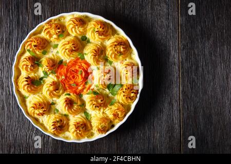 Fish pie, fisherman pie, made with white fish poached in a white sauce and topped with mashed potatoes, british cuisine Stock Photo