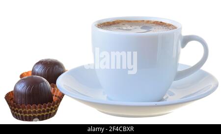 Cup of coffee and candy isolated on a white background. Stock Photo