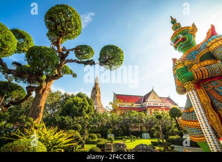 Demon (Giant or Yak) Guardian at Temple of Dawn (Wat Arun Ratchawararam Ratchawaramahawihan or Wat Arun) in Bangkok, Thailand Stock Photo