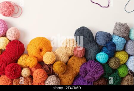 Balls of wool in various colors, on white background Stock Photo