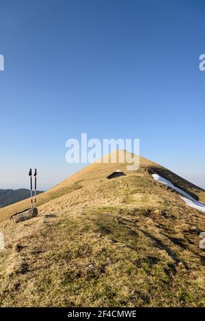 Shelter, hut or cottage on a hill and walking sticks in the Gantrisch Nature Park, Canton of Bern, Bernese Oberland, Swiss Alps, Switzerland, CH Stock Photo