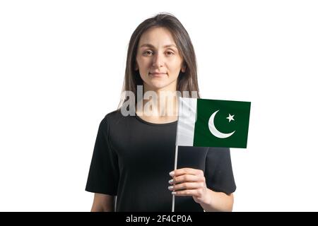 Happy young white girl holding Pakistan flag isolated on a white background. Stock Photo