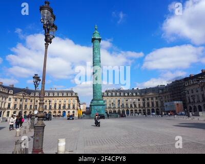 Paris, France. 20th Mar, 2021. The Place Vendome with the Vendome Column in the city centre is almost deserted. In the fight against the Corona pandemic, new restrictions are in place in Greater Paris and other parts of France since Saturday, March 20, 2021. However, people can go outside during the day without time restrictions. Of the approximately 67 million people in France, about one in three is affected by the tougher measures. Credit: Christian Böhmer/dpa/Alamy Live News Stock Photo