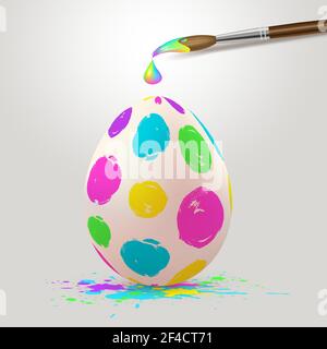 Hand painted multicolored Easter egg and paintbrush. Realistic vector illustration. Stock Vector
