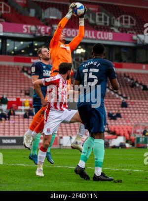20th March 2021; Bet365 Stadium, Stoke, Staffordshire, England; English Football League Championship Football, Stoke City versus Derby County; Goalkeeper Kelle Roos of Derby County goes up high to make a save Stock Photo