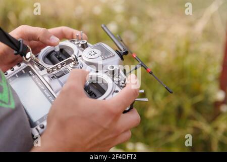 Drone copter remote telemetry controller in male hands Stock Photo