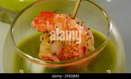 Shrimp cocktail in shot glass shot closeup. Stock Photo