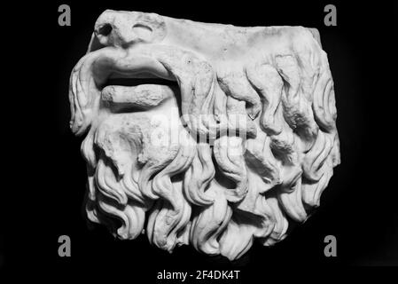 Black and white photo of lower part of male face sculpted in marble Stock Photo