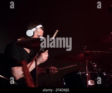 drummer running amok at a rock concert Stock Photo