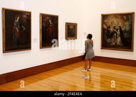 MEXICO CITY, MEXICO - MARCH 16: A person looks a paint during a tour inside at Munal Museum, amid orange alert of Covid-19, while  it has been allowed resumption museums. The National Art Museum applies sanitary measures in its reopening to the public by presenting the permanent exhibitions: The 20th Century in the 21st, Mural Collection; works by muralists Dr. Atl, Maria Izquierdo, Rufino Tamayo, JosÈ Clemente Orozco, Diego Rivero and David Alfaro Siqueiros, among many others. On March 16, 2021 in Mexico City, Mexico. Credit: Luis Barron/Eyepix Group/The Photo Access Stock Photo