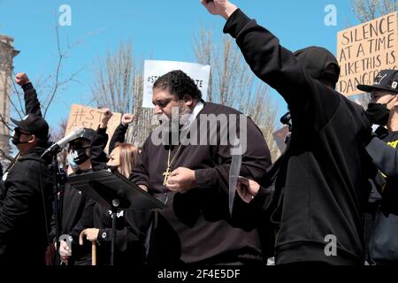 Atlanta, Georgia, USA. 20th Mar, 2021. Co-Chair of the Poor People's Campaign, Reverend William Barber II speaks to a crowd of demonstrators at a Stop Asian Hate March and Rally in Atlanta. The demonstration was held just days after the deadly shootings at three Asian operated spas in Georgia that left eight people dead, six of which were of Asian descent. The shooter, a white man named Robert Aaron Long, has been arrested and charged with eight counts of murder. Credit: John Arthur Brown/ZUMA Wire/Alamy Live News Stock Photo