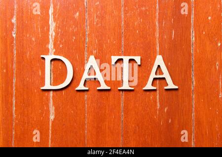 Alphabet letter in word data on old red color wood plate background Stock Photo