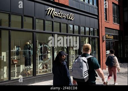 Washington, USA. 14th Mar, 2021. Pedestrians walk past a Madewell storefront in Washington, DC, on Sunday, March 14, 2021, amid the coronavirus pandemic. (Graeme Sloan/Sipa USA) Credit: Sipa USA/Alamy Live News Stock Photo