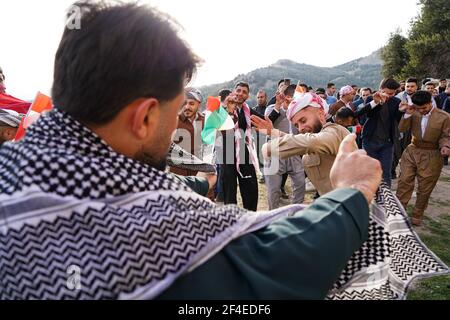 Iraqi Kurds dancing during the Nowruz celebration.The town of Akre in ...