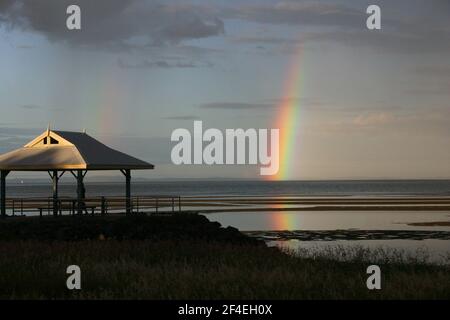 RAINBOW OVER MORETON BAY, BRISBANE, QUEENSLAND, AUSTRALIA. Stock Photo