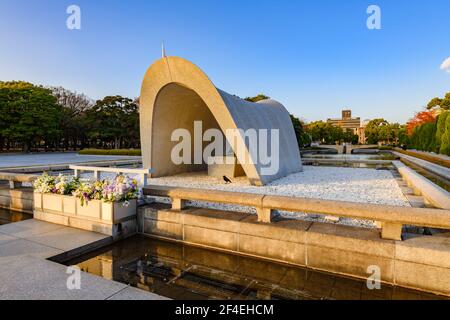 Hiroshima, Japan - 29 November 2018: Peace memorial cenotaph monument in remembrance of Atomic bomb victims. The Hiroshima Peace Memorial Park is visi Stock Photo