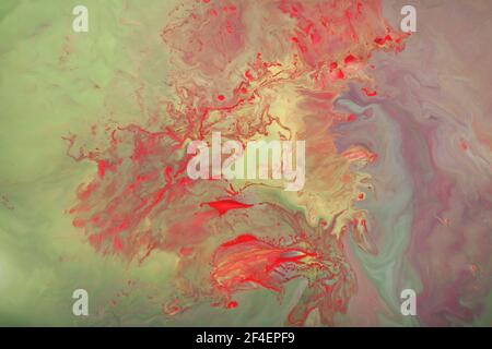 yellow , green and red abstract paint background, texture art. marble background.floating colored ink on water. Stock Photo