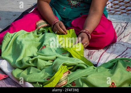 Ladies tailor sewing cloth handmade Stock Photo