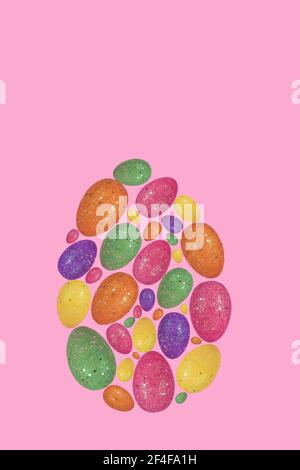 Creative Easter egg made with colorful eggs on bright pink background. Minimal easter concept. Trendy Easter card with free space for text. Stock Photo