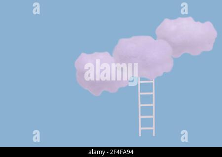 Creative idea with white clouds and ladder on bright blue background. Minimal concept of growth, future, success and development. Stock Photo