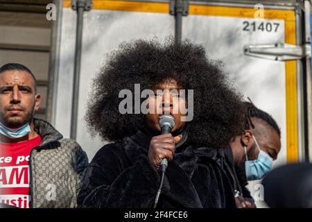 Paris, France. 20th March, 2021. Assa Traore speaks during the demonstration of families of victims of police violence Stock Photo