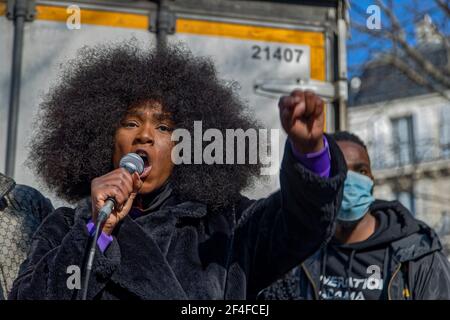 Paris, France. 20th March, 2021. Assa Traore speaks during the demonstration of families of victims of police violence Stock Photo