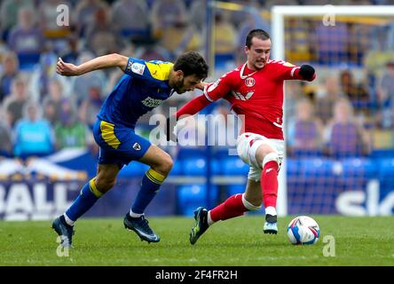 Charlton Athletic's Liam Millar (right) controls the ball during the Sky Bet League One match at Plough Lane, London. Picture date: Saturday March 20, 2021. Stock Photo
