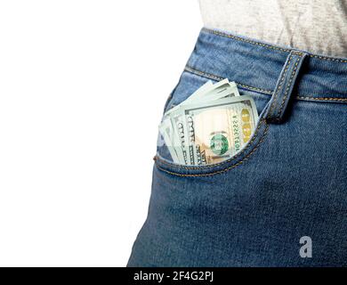 US dollar banknotes in the right front pocket of blue jeans. Concept of saving money or pocket expenses Stock Photo