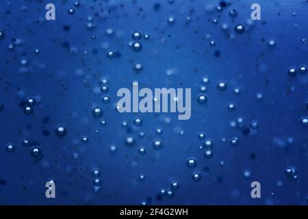 Abstract Blue water bubbles background or texture. Shallow depth of field image Stock Photo