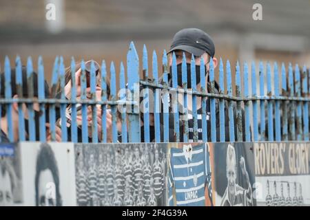 Featherstone, England - 21st March 2021 - Fans outside the match observe the Rugby League Betfred Challenge Cup Round 1 match between Featherstone Rovers vs Bradford Bulls at Millenium Stadium, FeatherstoneUK  Dean Williams/Alamy Live News Stock Photo