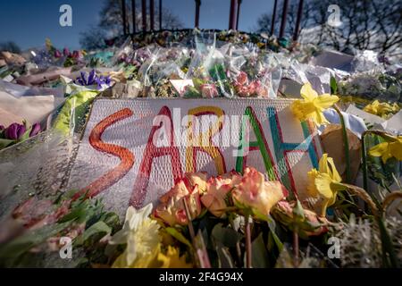 London, UK. 21st March, 2021. Death of Sarah Everard: Floral tributes continue at Clapham Common bandstand in memory of murdered 33-year-old marketing executive Sarah Everard who went missing on Wednesday 3rd March after leaving a friend's house near Clapham Common to walk home. Credit: Guy Corbishley/Alamy Live News