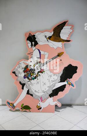 tokyo, japan - may 14 2018: Life sized standee depicting an illustration of a Japanese girl in wedding dress during the exhibition of Yusuke Nakamura Stock Photo