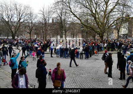 Bristol, UK. 21st Mar, 2021. UK. On a very warm afternoon at College Green Bristol, thousands of people attended a Vigil for Sarah Everard, and then marched with banners through the city chanting Kill the Bill. Picture Credit: Robert Timoney/Alamy Live News Stock Photo
