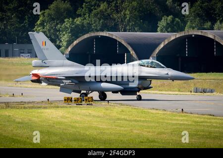 Belgian Air Force F-16 fighter jet plane taxiing to the runway at Florennes Air Base, Belgium - June 15, 2017 Stock Photo