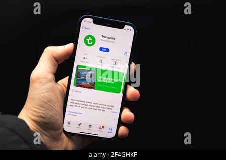 Kharkov, Ukraine - March 17, 2021: Traveler using Transavia Airlines application photo Stock Photo