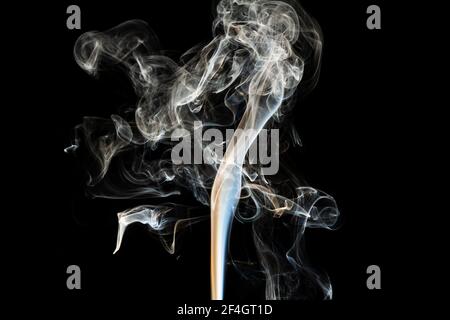 Grey smoke abstract texture, isolated effect with dark background Stock Photo