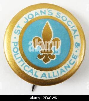 Pinback button in blue, white and gold for Saint Joan's Social and Political Alliance, an outgrowth of the Catholic Women's Suffrage Society, promoting women's suffrage, 1911. Photography by Emilia van Beugen. () Stock Photo
