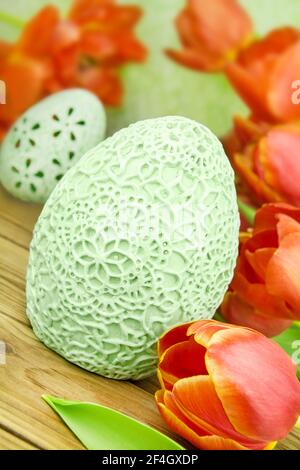 Easter decoration eggs and tulips Stock Photo