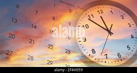 Clock and calendar in bright sky. Time passing Stock Photo